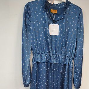 blue satin maxi dress with white design, elegant ruffle at waist and bottom